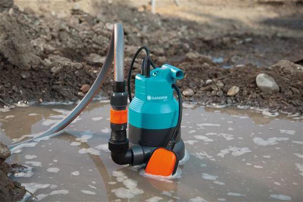 Откачка грязной воды дренажным насосом Откачка грязной воды
